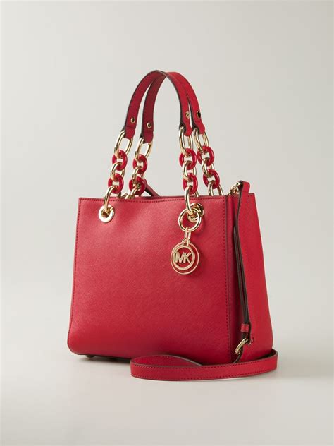 michael kors black purse with roc|Michael Kors small red purse.